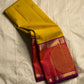 Mangai Manjal Chakram — Kanchipuram Pure Silk

Sun-yellow body with tiny zari buttas • Korvai contrast border

Rani-pink shot with purple selvedge • chakram medallions

Vaira-oosi diamond pallu with dual-tone tassels

Silk Mark Certified • Free shipping