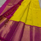 Crafted from pure Kanchipuram silk, this golden yellow saree features a broad pink border with traditional Yali motifs. The pallu is richly woven with bold elephant designs in thick zari—an elegant blend of heritage and grandeur.