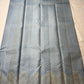 Chamomile — Kanchipuram Pure Silk

Pale gray-blue body with silver roopa buttas all over

Temple gopuram-inspired zari borders in luminous silver

Rich silver brocade pallu with intricate detailing

Silk Mark Certified • Free Shipping within USA