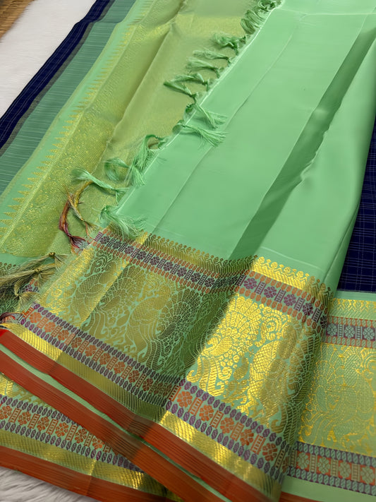 Pure silk kanchipuram royal navy blue checks  with beautiful cyan border adorned with hamsas varisaipet