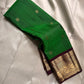 Harita Butta Brown – Pure Silk Kanchipuram
Harita-green body with gold buttas & aubergine-brown zari border
Silk Mark Certified • Free USA Shipping • Ships in Two Weeks