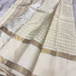 Sathia – A Radiant Ivory Kanchipuram Silk Saree with Zari Checks, Rettai Pet Rudhraksham Borders & a Grand Pallu Woven in Sacred Rudhraksham Motifs