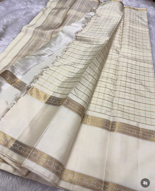 Sathia – A Radiant Ivory Kanchipuram Silk Saree with Zari Checks, Rettai Pet Rudhraksham Borders & a Grand Pallu Woven in Sacred Rudhraksham Motifs