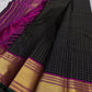 Charcoal Zari Kattam – Pure Kanchipuram Silk Saree
Rich Charcoal Black Body with Gold Zari Checks
Broad Golden Border with Magenta Highlights & Green Selvedge
Royal Magenta Pallu with Lustrous Zari Stripes

Silk Mark Certified, delivery in 2 weeks