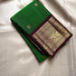 Harita Butta Brown – Pure Silk Kanchipuram
Harita-green body with gold buttas & aubergine-brown zari border
Silk Mark Certified • Free USA Shipping • Ships in Two Weeks