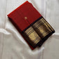 Crimson Earth – Red & Deep Brown Kanchipuram Pure Silk Saree ✨
Radiant Red Body with Golden Zari kamalam  Buttas
Deep Brown Korvai Border with Peacock Motifs
Majestic Brown Pallu with Ornamental Zari Weaving

Silk Mark Certified, delivery in 2 weeks