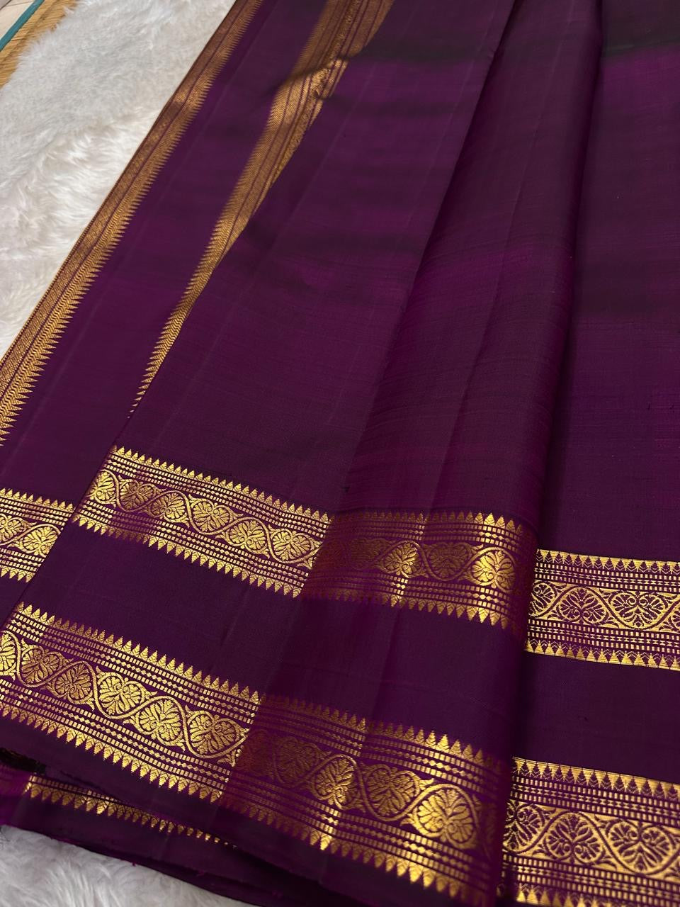 Nalini 💜✨
Deep Purple shot with magenta Pure Silk Kanchipuram Saree
Sonarupa Silver Butta & Rettapet Border
Thangam Velli Pallu with Timeless Elegance
Silk Mark Certified | Blouse fabric Attached | Free USA Shipping