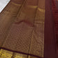 Amber Oosikattam ✨ – Pure Kanchipuram Silk Saree
Burnished Amber-Gold Body in Oosi Zari Kattam with Leaf Buttas
Deep Maroon Korvai Border with Green Selvedge & Elephant Motifs
Regal Maroon Pallu with Intricate Gold Zari Brocade
Silk Mark Certified |