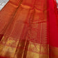 Srija – Red-Orange zari kattam  Kanchipuram Pure Silk Saree with Zari Checks, Kamalam Buttas & Vanasringaram Border