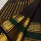 Border edge showing deep brown and bottle green and finely finished zari selvedge on Kanchipuram silk