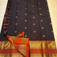 Dense gold zari pallu detail of dark charcoal and cinnamon red rettapet Kanchipuram silk saree — Idam Living