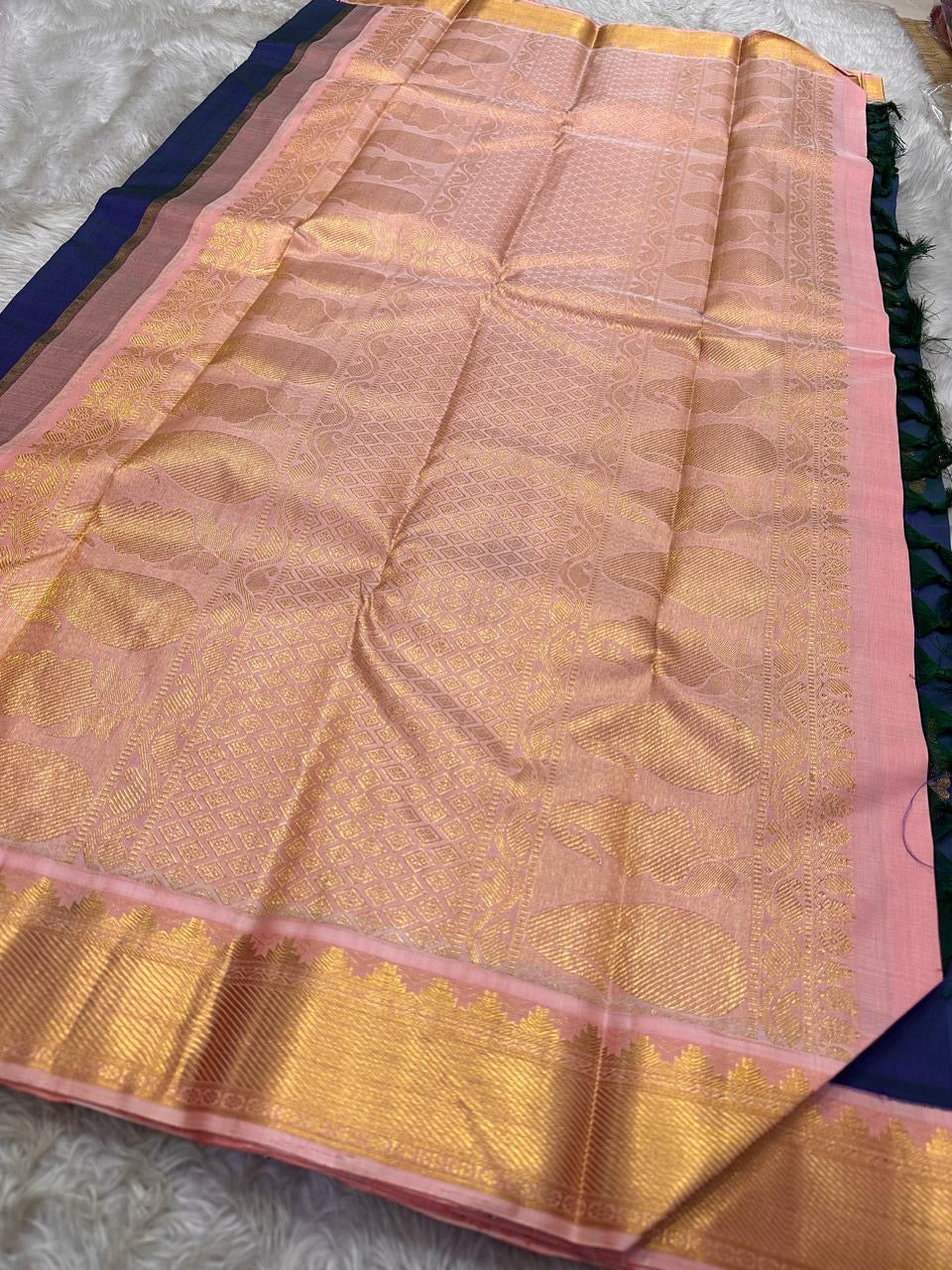 Full peach zari woven pallu spread with blush pink border on Kanchipuram silk saree shipped from New Jersey USA