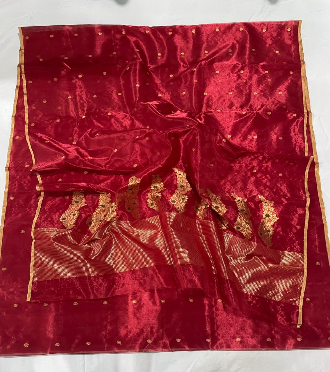 Full view of the Crimson Red handloom Jari Silk Chanderi saree with gold floral buttas and woven pallu
