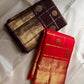 Ambaram – Sindhuram - Silk mark certified Kanchipuram silk

Elephant Procession Zari Border • Coin & Gandaberunda Buttas

Copper-Orange Brocade Pallu with Diamond-Jaal

Handloom • Running Red Blouse with Zari Border

Silk Mark Certified • Ships in Two Wee