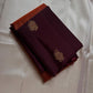 Rust Orange & Wide Broad Silk Korvai – Pure Kanchipuram Silk Saree

Deep wine body adorned with gold ambi buttas for subtle elegance

Contrast rust-orange wide korvai border with podi-kattam micro checks

Grand wine pallu with full-zari diamond jaal