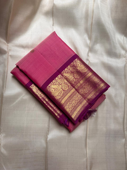 A dazzling blend of pink and purple silk, enriched with golden zari for a look that’s both festive and feminine.