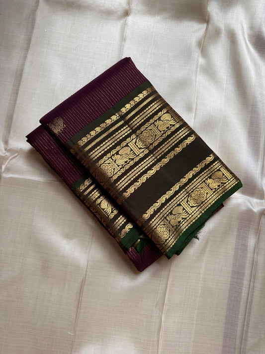Radhe ✨
Plum Purple Oosi-Striped Kanchipuram Silk
Zari-Woven Yaali Motifs on the Body
Bottle-Green Rettapet Border with Peacocks
Grand Gold Zari Jaal Please | Silk Mark Certified
