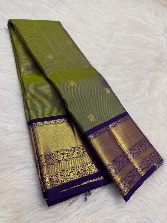 Olive green pure silk Kancheepuram Vairaoosi saree with fine zari lines, full drape view