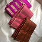 vasantham  Fuchsia pink – Handwoven Kanchipuram Silk Saree A poem in Fuchsia silk. The body glows in a serene vibrant Fuchsia, softly accented by delicate gold vertical lines and dainty gold zari buttas that glint like little blessings.