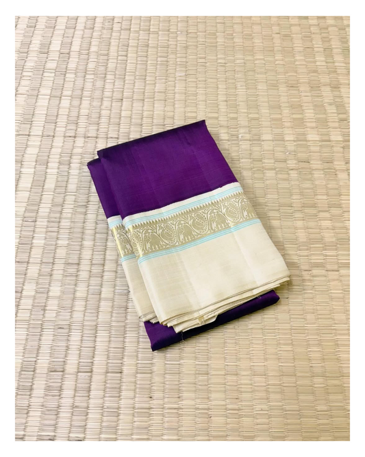 ilaa 💜✨ – Deep Purple & Royal Ivory Silk Saree
Exquisite deep purple paired with serene royal ivory accents.
Intricate 3G zari work with delicate turquoise silk thread highlights.
Vanasringaram-style border with Seer Pallu for traditional elegance.