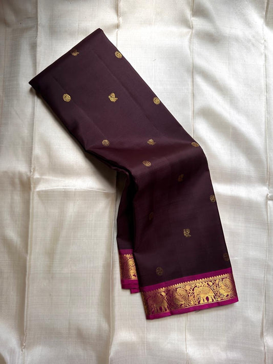 Deep chocolate silk with magenta Vanasingaram border mayil chakram small buttas beautiful ornate Pallu with kili motifs