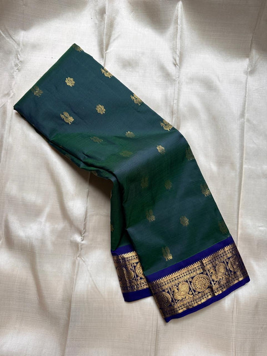 Swaram Lightweight – Enchanted Teal
Feather-Light Teal Green Kanchipuram Silk Saree
Royal Blue Zari Borders with Peacock Medallions