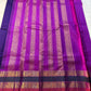 Peacock Purple Rajam – Pure Silk Kanchipuram Saree
Deep Peacock Purple Body with Gold Zari Buttas
Korvai Borders with Temple, Peacock & Elephant Motifs
Rich Zari Pallu with Vertical Brocade Stripes
Silk Mark Certified | ships in two week| Blouse Stitching