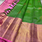 Mira 💚✨ – Pure Kanchipuram Silk Saree
In a Festive Vibrant Parrot Green Hue
Contrasting Pink Rettapet Border & Pallu
Intricate Vanasringaram Motifs in Zari Weave
Traditional Bavanji Border Detailing
Silk Mark Certified | Blouse Fabric Attached
