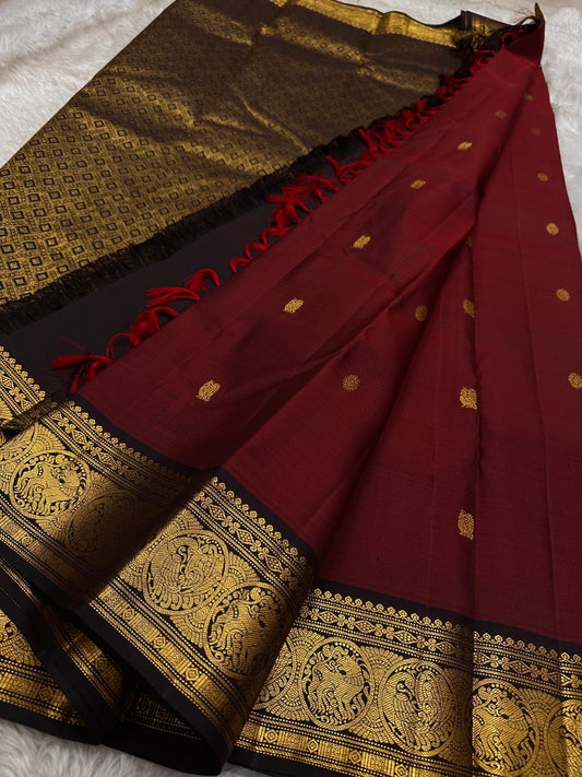 Raaga Deep Red
Garnet-Red Kanchipuram Silk Saree
Zari Medallion Border & Heritage Buttas
