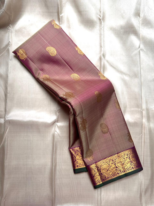 Rosewood Mayil
Antique Zari Palms in Regal Gold
A Handloom Kanchipuram Woven in Quiet Royalty