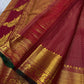 Mihira – Kalyana Arraku Kanchipuram Pure Silk Saree with Zari Kattam, Mayil & Kamalam Buttas, Floral Arai Madam Border, and Adai-Woven Parrot Pallu