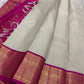 Shweta ✨ – Ivory Vairaoosi Pure Silk Saree
Ivory Radiance with Magenta Grandeur
Handwoven Vairaoosi Interlaced with Gold Filaments
Intricate Floral & Lattice Zari Borders in Regal Contrast
Opulent Magenta Zari Brocade Pallu — Timeless Heritage Elegance