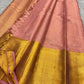 Varnika – Handwoven Kanchipuram Silk Saree in Rose Gold Pink
Graceful and radiant, this rose gold pink Kanchipuram silk saree features delicate gold zari paisleys and Gandaberunda motifs.