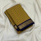 Forest Blossom Kattam — Pure Silk Kanchipuram Saree
Parrot-green, rani-pink & haldi-yellow kattam checks
Deep navy korvai borders with antique gold zari vines
Rich navy zari-striped pallu with tasseled edges
Silk Mark Cert • Free USA Shipping 1 week