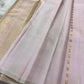 The daintiest blush pink with zari coin buttas in gold and silver pure silk Kanchipuram saree