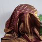 Wine plum pure silk Kanchipuram saree with gandaberunda butta detail and zari kattam flat lay