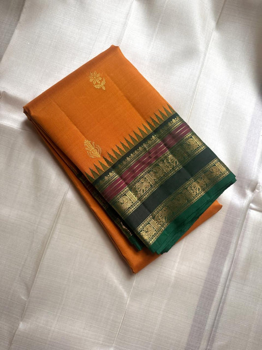 Lakshanam ✨ – Maambazha (Mango) Yellow Kanchipuram Pure Silk Saree
Korvai Deep-Green Border with Yazhi, Peacock & Elephant Varisaipet Panels
Temple-Tip Inner Edge & Rani-Magenta Accent Stripes
Intricate Zari-Weave Green Pallu with Chevron & Stripes