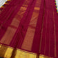 Full wine pallu spread with zari woven vertical lines and broad gold zari border finish