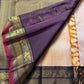 Sandhya 🌅 – Sun-Kissed Beige Kanchipuram Silk Saree with Subtle Vairaoosi Gold Filament ✨, Deep Purple Peacock Diamond-Pettu Zari Border 🦚, Deep Maroon Selvedge, and Zari-Embellished Pallu with Arai Maadam & Khalasam Motifs 🌿💛