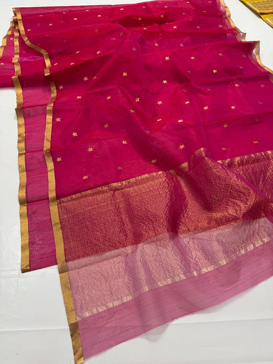 Pure Chanderi Silk by Katan – Rani Pink with Gold Buttas & Rose-Pink Tissue Pallu
Handwoven rani silk with tiny gold buttas, gold kaddi border & shimmering rose-pink tissue pallu ✨
Silk Mark Certified • Free Shipping within USA • Ships in Two Weeks