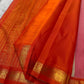 Amber Shubhra Butta — Pure Kanchipuram Silk Saree
Ivory body with golden zari buttas and vibrant amber-orange pallu
Pure 3gm zari • Silk Mark Certified • Free Shipping within USA