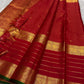 Kiran – Deep Red Kanchipuram Pure Silk Saree
Zari Checks with Delicate Buttas and Striped Rettapet Border
Richly Woven Pallu Accented by a bottle Green Selvedge
