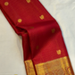 Nakshatra – Radiant Red Vairaoosi Kanchipuram Silk Saree Adorned with Mayil & Chakram Zari Buttas, Featuring an Ornate Kamalam and Floral Vine Zari Border, Flanked by Varisaipet Motifs, and a Pallu Woven with Sacred Thulasi Madams and Regal Kamalams