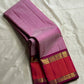 Gulabi Kattam – Pure Kanchipuram Silk Saree
Pastel Pink Body with Fine Zari Grid Checks
Raspberry Korvai Borders with Floral Zari Work
Grand Raspberry–Magenta Brocade Pallu
Silk Mark Certified | Fall & Pico Done | | ships in 2 weeks