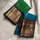 Harita Butta Brown – Pure Silk Kanchipuram
Harita-green body with gold buttas & aubergine-brown zari border
Silk Mark Certified • Free USA Shipping • Ships in Two Weeks