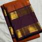 Poovizhi Rust Orange — Pure Kanchipuram Silk Saree
Deep aubergine body with rust-orange korvai borders & rich zari floral motifs
Silk Mark Certified • Blouse Stitching ($30) • Free Shipping within USA • Ships in Two Weeks