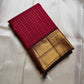 Ruby Zari Kattam – Pure Kanchipuram Silk Saree
Rich Ruby Red Body with Gold Zari Checks
Broad Golden Border with Maroon Highlights & Temple Motifs
Dual-Toned Maroon-Green Pallu with Intricate Zari Weaves

Silk Mark Certified, delivery in 2 weeks