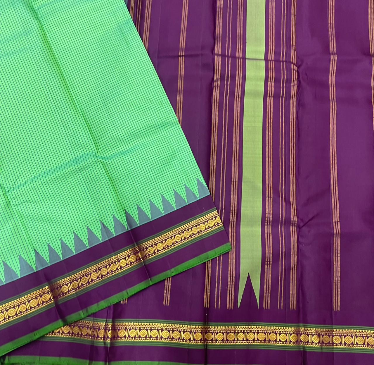 Jade Green Kattam Body • Plum-Purple Zari Border
Temple Triangles & Floral Bands
Silk Mark Certified • Free USA Shipping • Ships in Two Weeks ✅