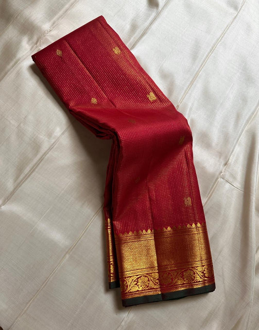 Mihira – Kalyana Arraku Kanchipuram Pure Silk Saree with Zari Kattam, Mayil & Kamalam Buttas, Floral Arai Madam Border, and Adai-Woven Parrot Pallu
