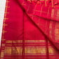Ravi Kiranam — Sona Roopa Kattam Kanchipuram Pure Silk

Vibrant festive red body with allover kattam (grid) checks

Gold & silver sona-roopa zari alternating for a soft shimmer

Grand kaddi border with rich zari paisley vines & floral tracery

Silk Mark